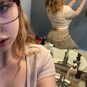 Lite pink cargo pants. Hella pockets